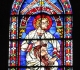 Saint Luc juché sur les épaules du prophète Jérémie - Lancette sous la rosace de la façade sud - Crédit Jean-Yves Cordier.